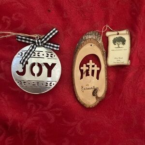 Christmas ornaments 1 from tin saying Joy and 1 from olive wood from Holy Land